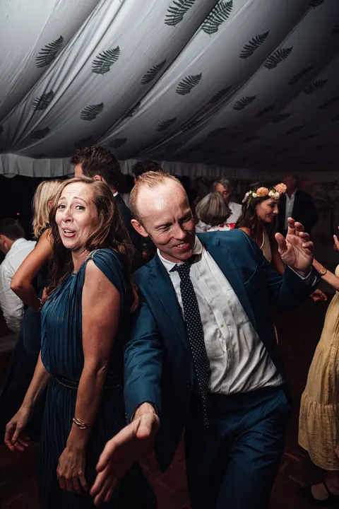 Guests dancing in the marquee