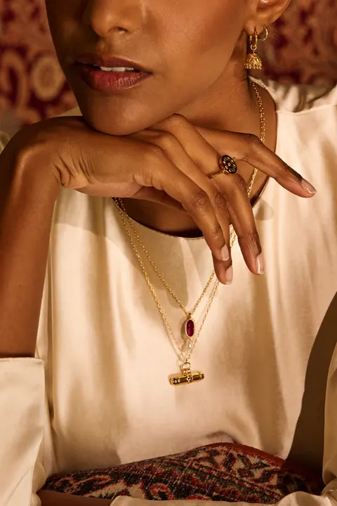 Close detail of a pendant necklace, profile view