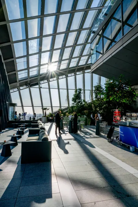 Sun streaming through the glass roof of Sky Garden before guests arrive