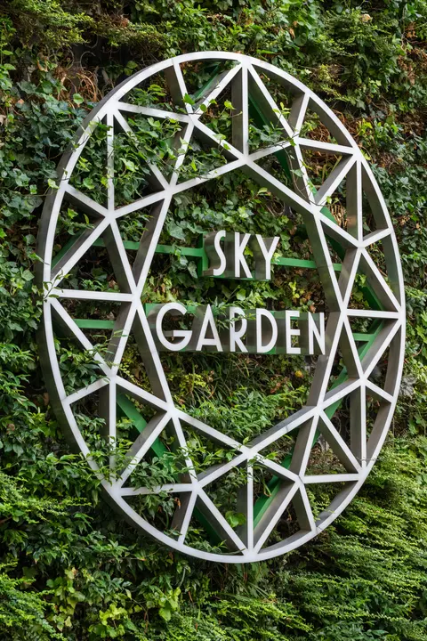 The Sky Garden logo set into a living wall of plants