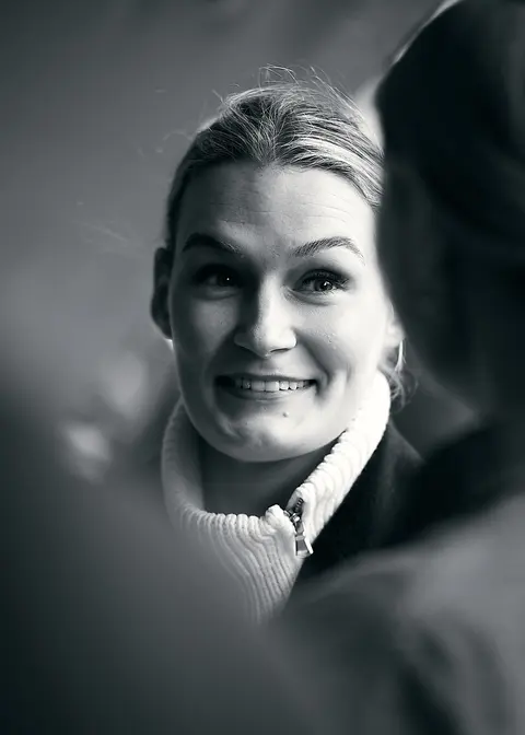 Black and white portrait of an older guest at dinner