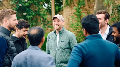 Guests chatting together in the garden