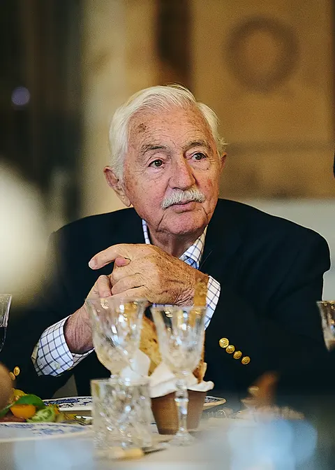 The same portrait of the older guest, in colour