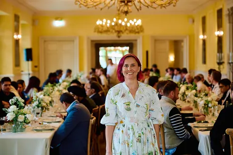 The dining hall in full swing, a wide view