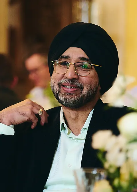 A guest in glasses, smiling portrait