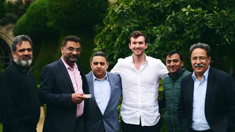 A group of guests posing together for a photo