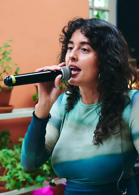 The singer of the band mid song in the orangery