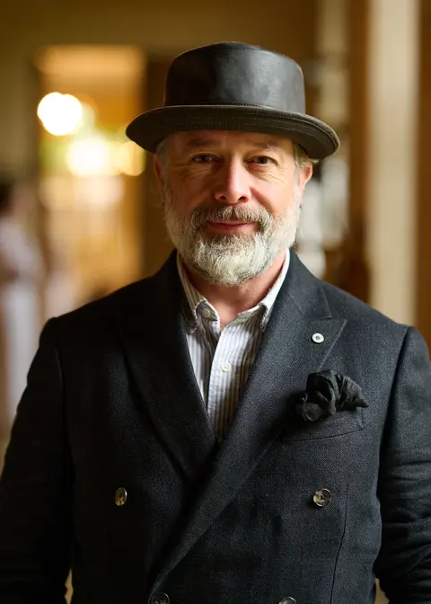 The bearded guest in a hat, a colour portrait
